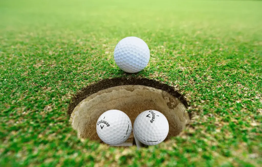 how many golf balls fit in a hole